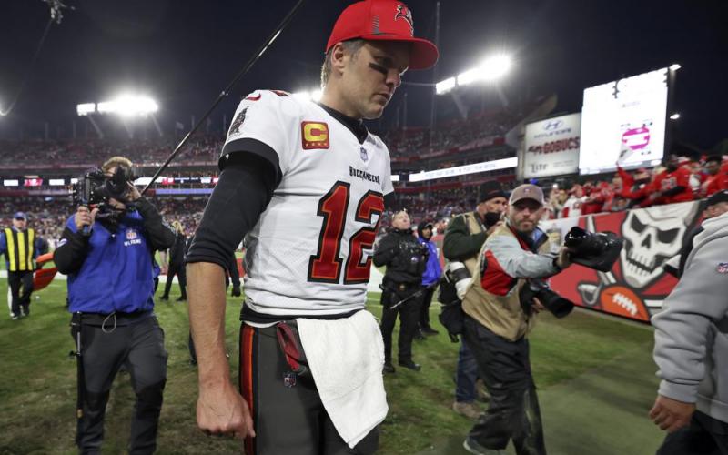 Tampa Bay Buccaneers quarterback Tom Brady reacts as he leaves the field after the team lost to the Los Angeles Rams in a divisional playoff game on Sunday in Tampa. (MARK LOMOGLIO/Associated Press)