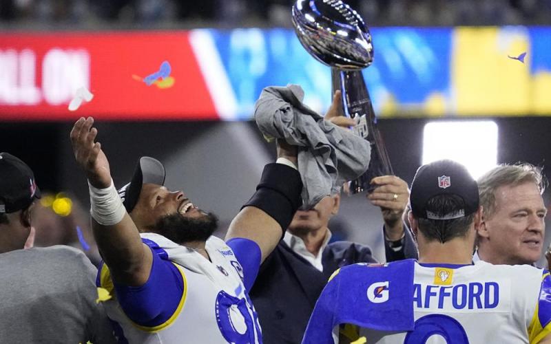 Los Angeles Rams defensive end Aaron Donald (99) celebrates after winning Super Bowl 56 over the Cincinnati Bengals on Sunday in Inglewood, Calif. The Rams won 23-20. (JULIO CORTEZ/Associated Press)
