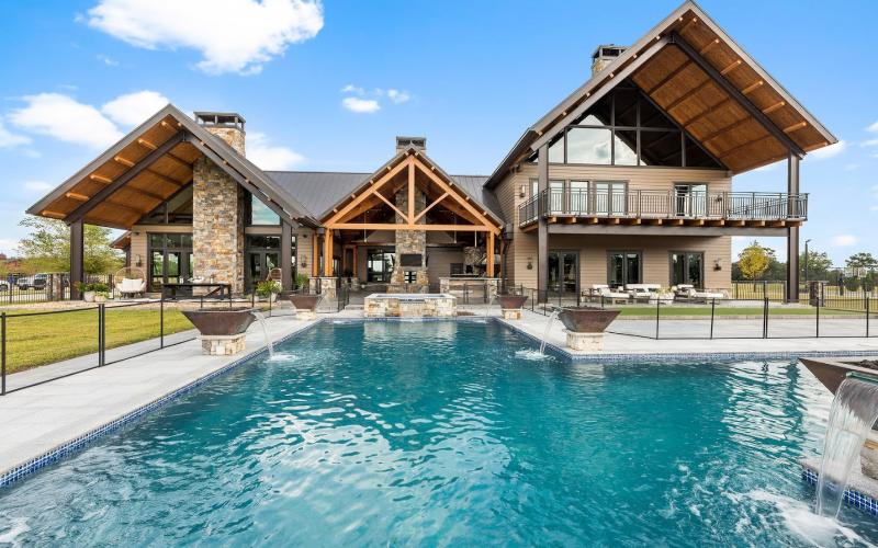The swimming pool at the Double Barrel Ranch shimmers in the afternoon light. The ranch, located on SW Mandiba Drive, sold for $4.25M in January. (COURTESY)
