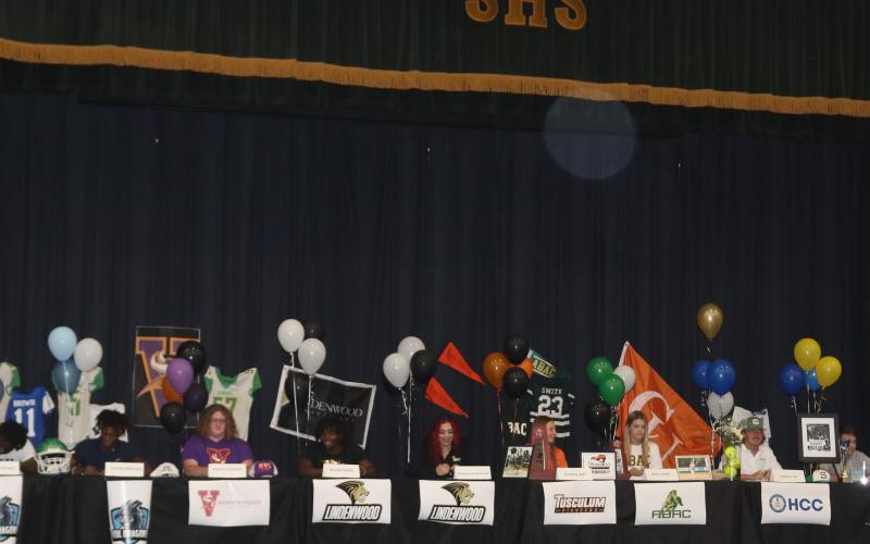 Twelve Suwannee seniors signed letters of intent during a ceremony Wednesday afternoon at the school. Signing were Jimariai Brooks (from left), Andrew Brown, Terrell Atkinson, Braxton Thompson, Austin Smith, Brooke-Lyn Hanuszak, Lindsay Self, Karis Smith, Matthew Gill, Peyton Slaughter, Tyson Musgrove and CJ Joyner. (JAMIE WACHTER/Lake City Reporter)