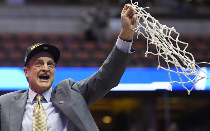 Oklahoma head coach Lon Kruger cuts down the net after their win against Oregon in the regional finals of the NCAA Tournament on March 26, 2016, in Anaheim, Calif. Kruger, who also led Florida to a Final Four, is part of a star-studded cast of coaches who will be inducted into the National College Basketball Hall of Fame in November. (AP FILE)