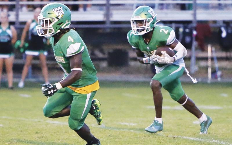 Suwannee’s Jay Smith (2) returns a kickoff against Columbia while Marquavious Owens looks to block during last Friday’s Preseason Classic. (BRENT KUYKENDALL/Lake City Reporter)