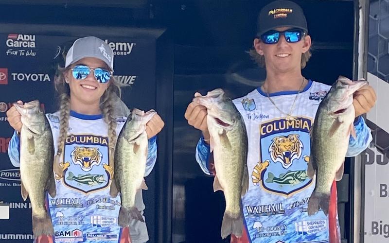 CHS Bassmasters Anna Swisher (left) and Ty Jackson (right) hold up their haul at the Abua Garcia Bassmaster High School National Championship. (COURTESY)