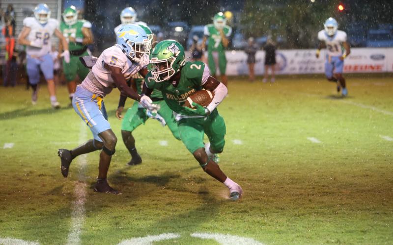 Suwannee wide receiver Jay Smith spins away from Chiefland defender Anthony Blackman at Langford Stadium on Friday night. (PAUL BUCHANAN/Special to the Reporter)
