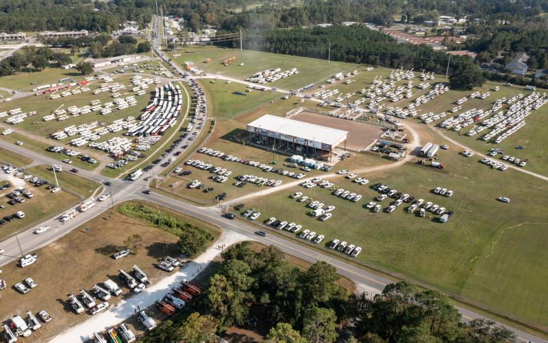 Utility crews from across the country poured into the Florida Gateway Fairgrounds at a Florida Power & Light processing site Monday in preparation for emergency response efforts for Hurricane Ian. (RAY CARPENTER/Special to the Reporter)