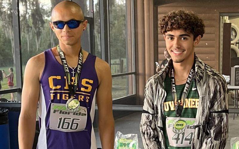 Columbia’s Jose Rodriguez (left) placed fourth and Suwannee’s Morgan Mobley (right) placed seventh at the Alligator Lake XC Invitational on Tuesday. (COURTESY)