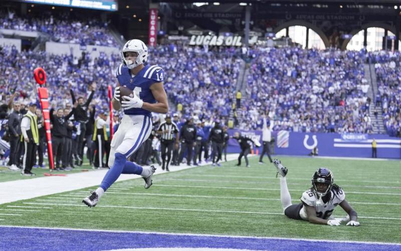 Indianapolis Colts receiver Alec Pierce scores a touchdown ahead of Jacksonville Jaguars cornerback Shaquill Griffin during Sunday’s game in Indianapolis. (AJ MAST/Associated Press)