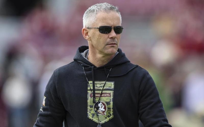 Florida State head coach Mike Norvell walks the field before Saturday’s game against Louisiana in Tallahassee. (GARY MCCULLOUGH/Associated Press)