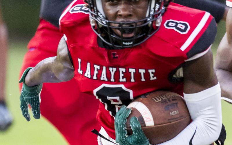 Lafayette running back JT Cook runs upfield in an earlier game this season. (FILE)