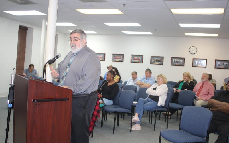 Columbia County Manager David Kraus answers questions about the county’s interest in Richardson Community Center at Tuesday’s meeting. (TONY BRITT/Lake City Reporter)