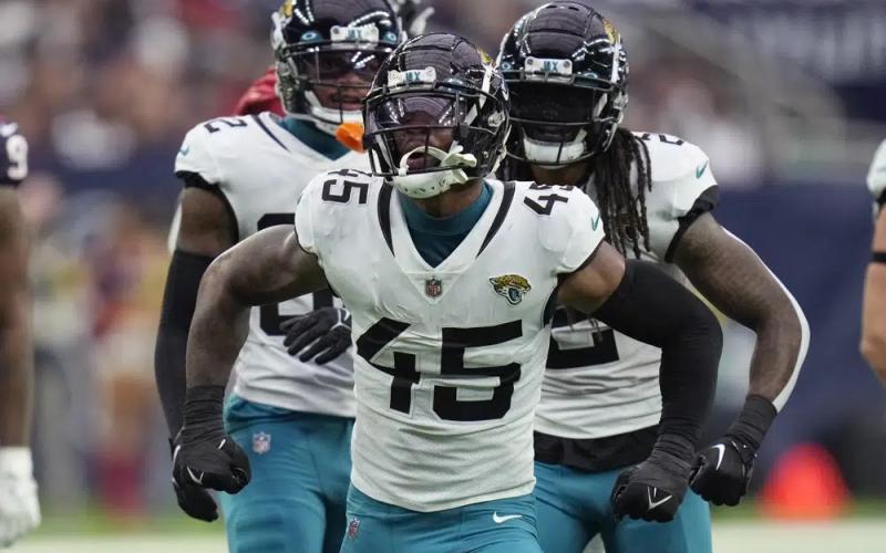 Jacksonville Jaguars linebacker K'Lavon Chaisson celebrates a play against the Houston Texans during Sunday's game in Houston. (ERIC CHRISTIAN SMITH/Associated Press)