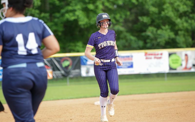 Columbia first baseman Kimber Long trots around the bases after hitting a two-run home run against P.K. Yonge on Tuesday night. (BRENT KUYKENDALL/Lake City Reporter)