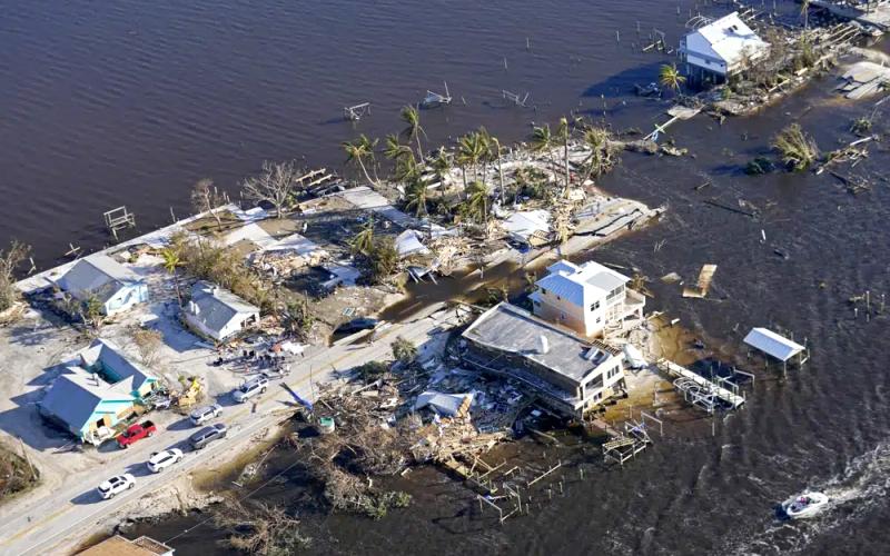 The bridge leading from Fort Myers to Pine Island is seen heavily damaged in the aftermath of Hurricane Ian on Pine Island on Oct. 1. (GERALD HERBERT/AP File)