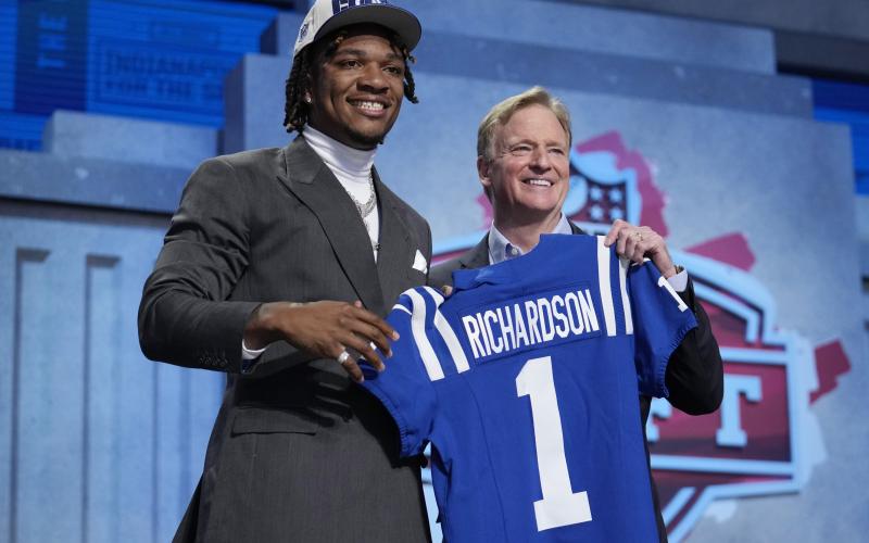 Florida quarterback Anthony Richardson (left) poses with NFL Commissioner Roger Goodell after being chosen by the Indianapolis Colts with the fourth overall pick during the first round of the NFL draft on Thursday in Kansas City, Mo. (JEFF ROBERSON/Associated Press)