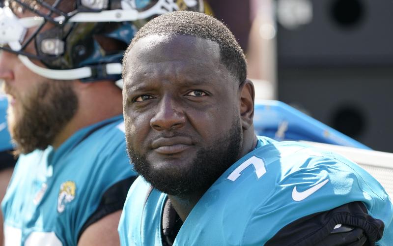 Jacksonville Jaguars offensive tackle Cam Robinson watches play against the New York Giants on Oct. 23, 2022, in Jacksonville. (JOHN RAOUX/AP File)