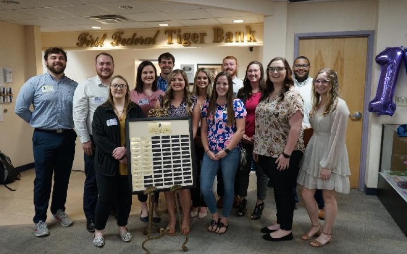 Past interns at the First Federal Tiger Bank at Columbia High School are pictured during the 15-year anniversary celebration. (COURTESY)