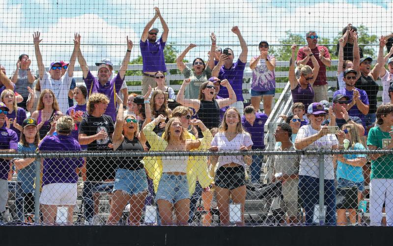 Columbia fans celebrate the Tigers' 8-4 win over Lincoln on Saturday in the Region 1-5A semifinals. (BRENT KUYKENDALL/Lake City Reporter)