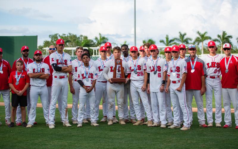 Lafayette's baseball team poses with the Class 1A state runner-up trophy. (JESSICA PINALD/Special to the Reporter)
