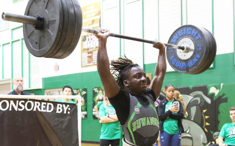 Suwannee’s Marquavious Owens completes the clean and jerk during the District 5-1A meet on March 31. (PAUL BUCHANAN/Special to the Reporter)