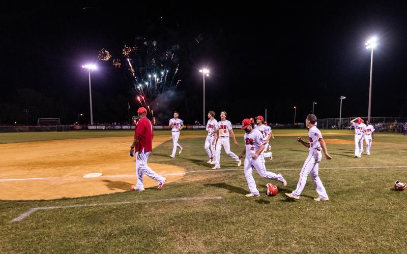 Lafayette's baseball team celebrates with fireworks after defeating Union County to win the Region 3-1A title on Saturday night. (JACK HOWDESHELL/Special to the Reporter)