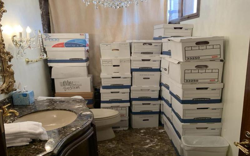 This image, contained in the indictment against former President Donald Trump, shows boxes of records stored in a bathroom and shower in the Lake Room at Trump's Mar-a-Lago estate in Palm Beach. Trump is facing 37 felony charges related to the mishandling of classified documents according to an indictment unsealed Friday. (Justice Department via AP)
