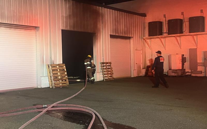 Crews from Lake City Fire Department and Columbia County Fire Rescue extinguished a fire around 3 a.m. Tuesday in the service area of the Honda of Lake City dealership. (COURTESY)