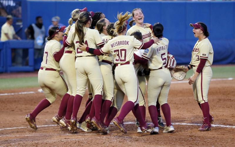Florida State celebrates after defeating Tennessee in the Women’s College World Series semifinals on Monday in Oklahoma City. (NATE BILLINGS/Associated Press)