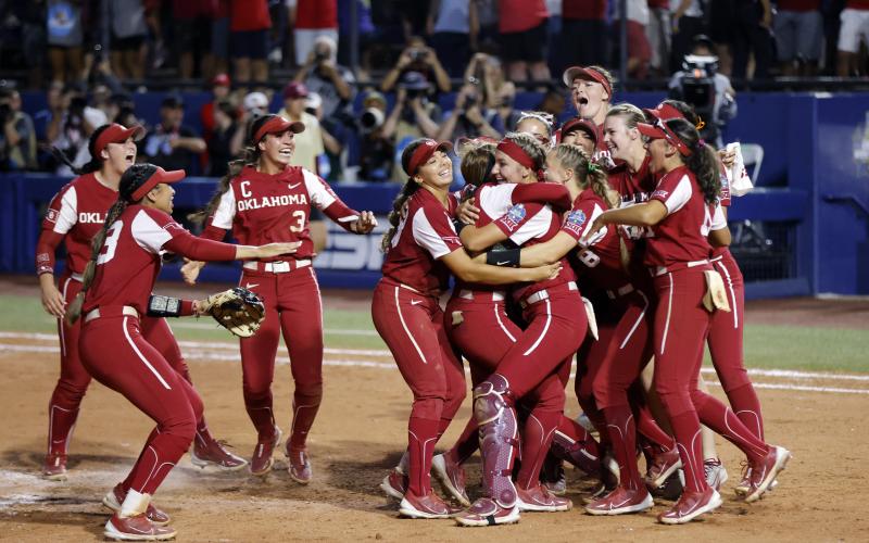 Oklahoma players celebrate after winning the Women's College World Series championship series over Florida State on Thursday in Oklahoma City. (NATE BILLINGS/Associated Press)