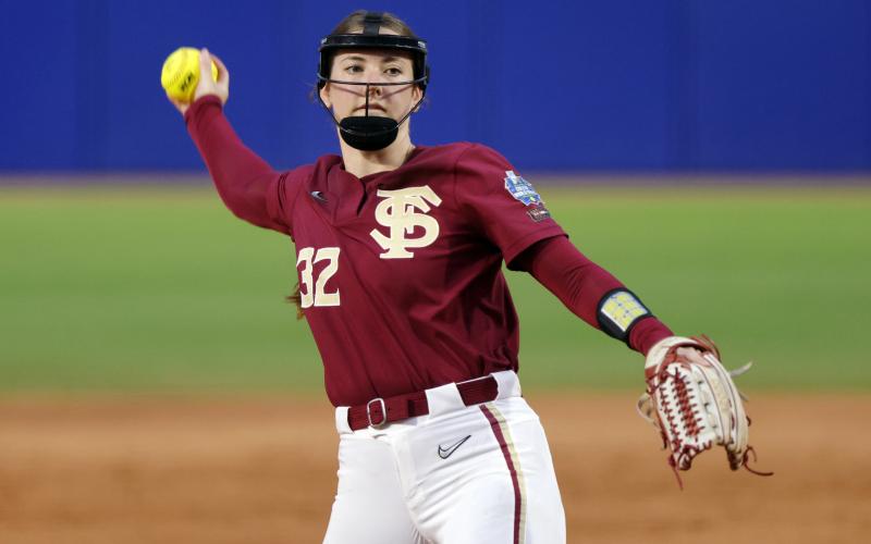 Florida State's Kathryn Sandercock pitches against Washington during a Women's College World Series game on Saturday in Oklahoma City. (NATE BILLINGS/Associated Press)