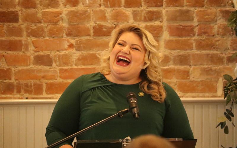 U.S. Rep. Kat Cammack (R-Gainesville) laughs during her update at the Lake City-Columbia County Chamber of Commerce’s Legislative Breakfast on Tuesday at The Blanche Hotel. (JAMIE WACHTER/Lake City Reporter)