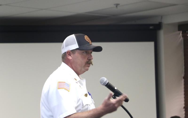 Lake City Fire Chief Josh Wehinger briefs the Lake City Council on Tropical Storm Idalia updates Monday afternoon. (MORGAN MCMULLEN/Lake City Reporter)