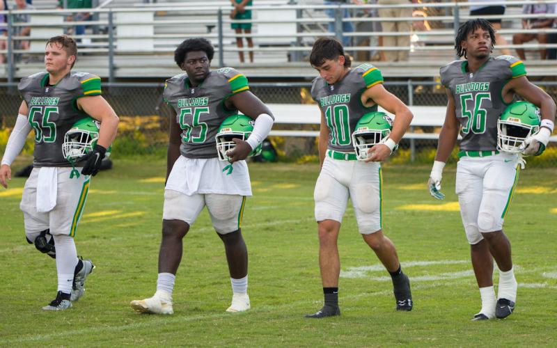 Suwannee captains Andrew Harrell (65), Justice Leggett (55), Kodi Lang (10) and Jadarius Cherry (56) walk out on to the field for the coin toss prior to last Friday’s Preseason Classic against Columbia. (BRENT KUYKENDALL/Lake City Reporter)