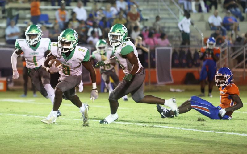 Suwannee defensive back Demontay Brown (3) returns an interception against Taylor County last Friday. (PAUL BUCHANAN/Special to the Reporter)