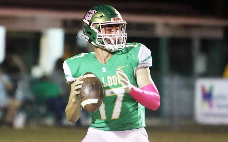 Suwannee quarterback Koy Frier drops back to pass against Wakulla on Friday. (PAUL BUCHANAN/Special to the Reporter)