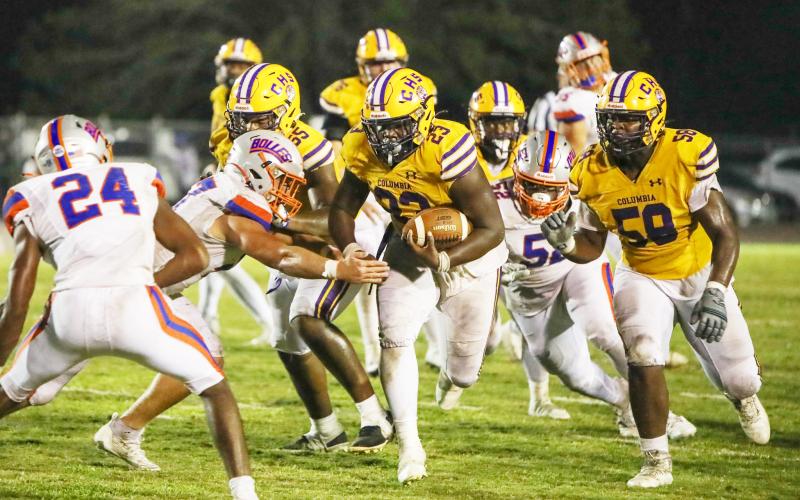 Columbia running back Jonathan Andrews runs up the field against Bolles on Oct. 6. (BRENT KUYKENDALL/Lake City Reporter)