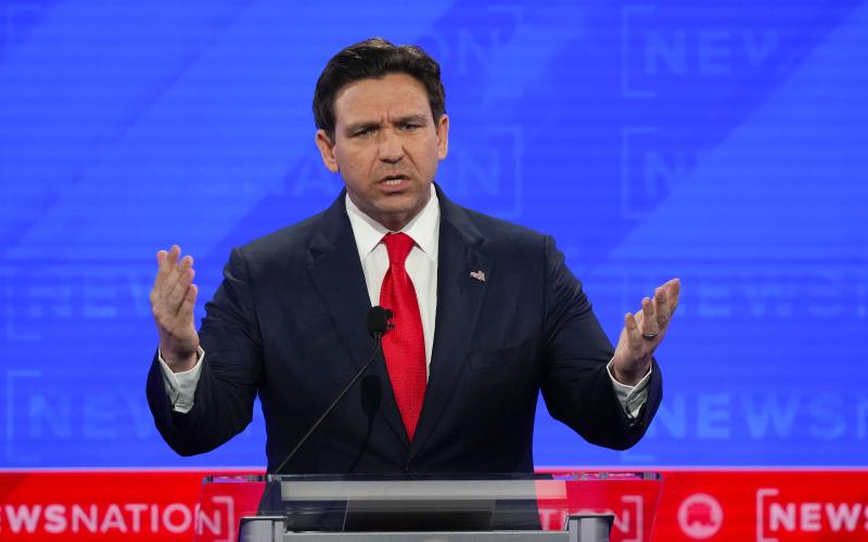Republican presidential candidate Florida Gov. Ron DeSantis gestures during a Republican presidential primary debate hosted by NewsNation on Wednesday at the Moody Music Hall at the University of Alabama in Tuscaloosa, Ala. (GERALD HERBERT/Associated Press)