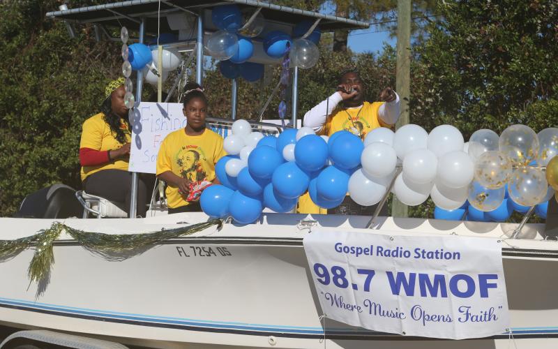 Trenton ‘Live Oak’ Anderson sings on the 98.7-FM gospel radio station’s entry in last year’s Martin Luther King Jr. Day parade in Live Oak. (FILE)