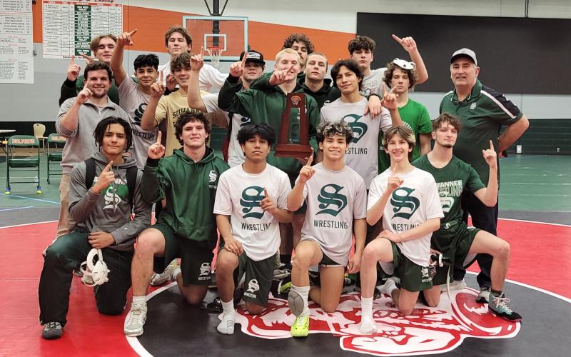 Suwannee celebrates after winning the District 2-1A duals on Friday. (COURTESY)