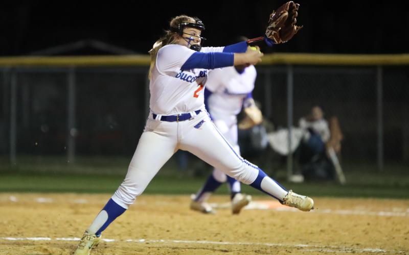 Branford pitcher Laila Arnold winds up to pitch against Columbia on Feb. 22. (BRENT KUYKENDALL/Lake City Reporter)