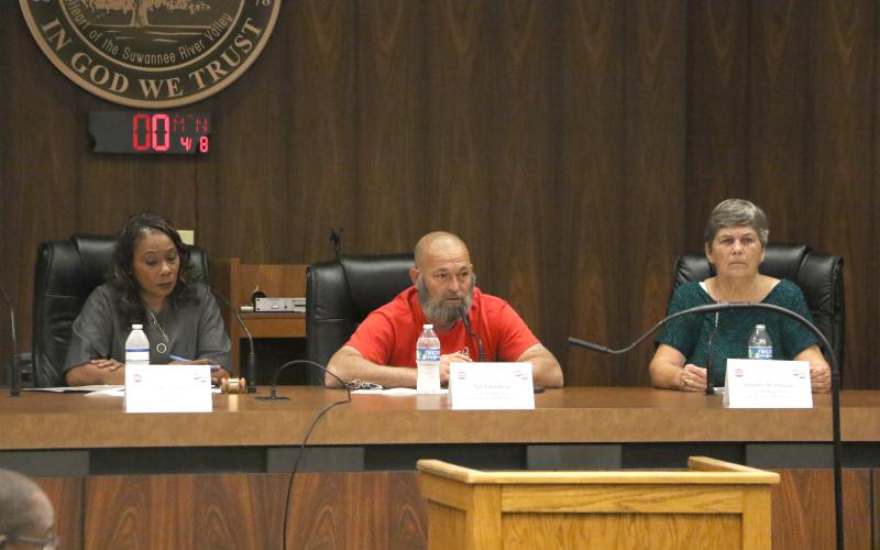 Live Oak Council candidates Vanessa Brown Robinson (from left), Jeff Chaillou and Gladys Owens answer questions from the dais during Monday’s candidate forum hosted by the Suwannee County Voters League. (MORGAN MCMULLEN/Lake City Reporter)