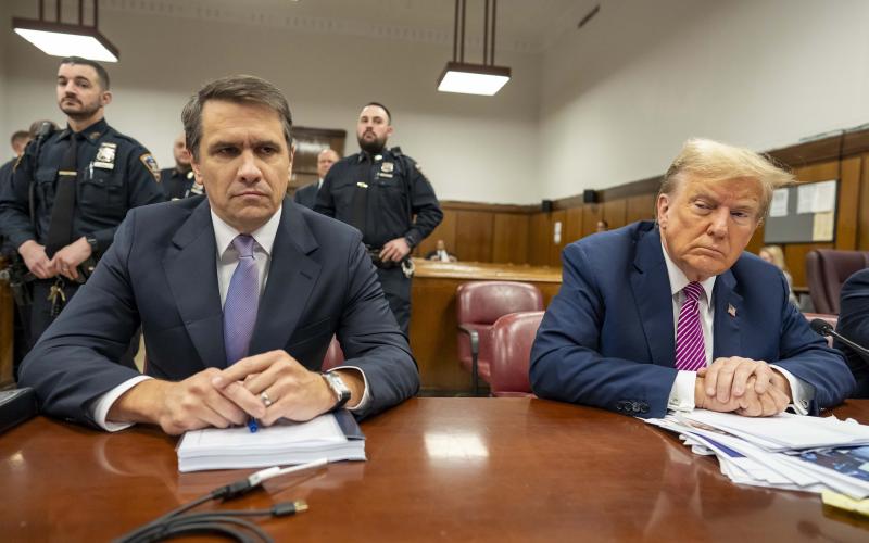 Former President Donald Trump (right) sits with his attorney Todd Blanche during his criminal trial as jury selection continues at Manhattan Criminal Court on Friday in New York City. (Mark Peterson/Pool/Getty Images/TNS)